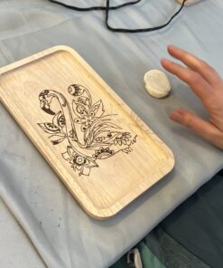 wall of fame van de mooiste kunstwerken die gemaakt zijn tijdens een van de vele workshops houtbranden